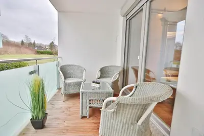 Ein Sitzbereich in der Unterkunft Dünenhaus Dünenhaus 3 Appartement 9
