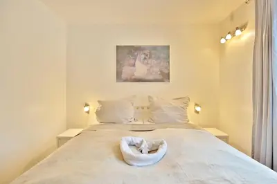 Ein Bett oder Betten in einem Zimmer der Unterkunft Residenz am Fischerstieg Residenz am Fischerstieg Appartement 2