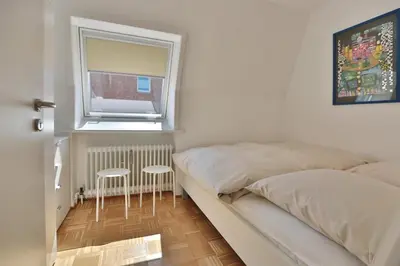 Ein Bett oder Betten in einem Zimmer der Unterkunft Domizil Seestraße Domizil Seestraße