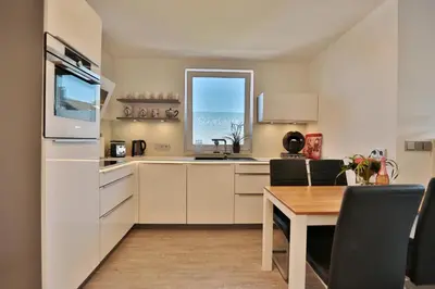 Küche/Küchenzeile in der Unterkunft Haus Möwenberg 14 Haus Möwenberg Appartement 9
