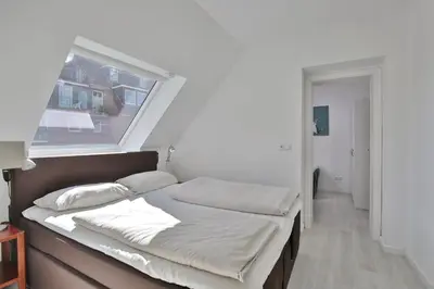 Ein Bett oder Betten in einem Zimmer der Unterkunft Haus Hansastrasse 13 Haus Hansastrasse Appartement 17