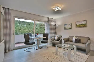 Ein Sitzbereich in der Unterkunft Haus Hansastrasse 13 Haus Hansastrasse Appartement 2