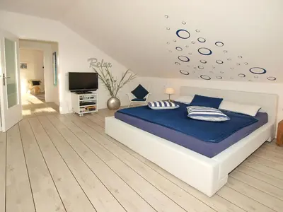 Ein Bett oder Betten in einem Zimmer der Unterkunft Haus an der Strandallee 112 Haus an der Strandallee 112 Appartement 7