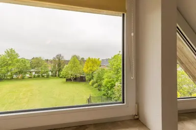 Ein Garten an der Unterkunft Ferienhaus Glockenstraße Ferienwohnung Ostseehöhe Appartement 2