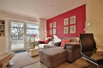 Ein Sitzbereich in der Unterkunft Strandperle Strandperle Appartement 203