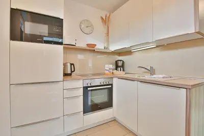 Küche/Küchenzeile in der Unterkunft Strandglück Haus C Strandglück Appartement 14C