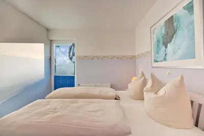 Ein Bett oder Betten in einem Zimmer der Unterkunft Barke Barke Appartement 1