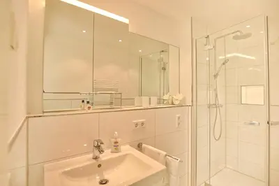 Ein Badezimmer in der Unterkunft Villa Seeperle II Herzmuschel Appartement 18