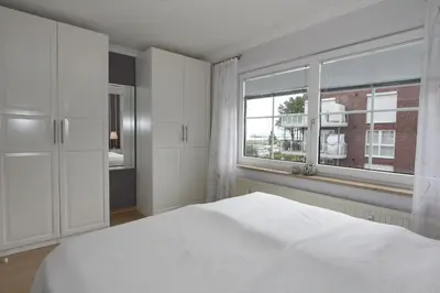 Ein Bett oder Betten in einem Zimmer der Unterkunft Haus Windrose Windrose Appartement 9