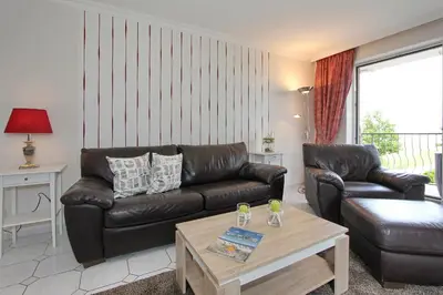 Ein Sitzbereich in der Unterkunft Haus Windrose Windrose Appartement 9