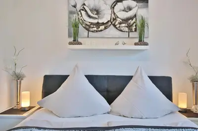 Ein Bett oder Betten in einem Zimmer der Unterkunft Residenz am Fischerstieg Residenz am Fischerstieg Appartement 16