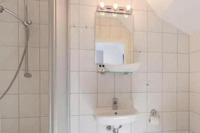 Ein Badezimmer in der Unterkunft Haus Seerose Seerose II Appartement 16