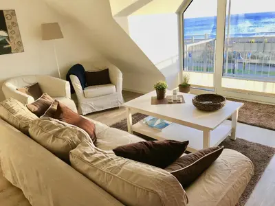 Ein Sitzbereich in der Unterkunft Strandduene Stranddüne Appartement 12