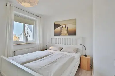 Ein Bett oder Betten in einem Zimmer der Unterkunft Witthus I Witthus Neue Bergstraße Appartement 14