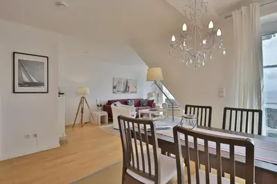 Ein Sitzbereich in der Unterkunft Stranddomizil Stranddomizil Appartement 13