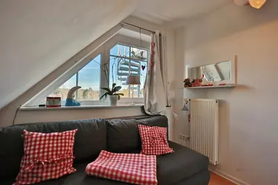 Ein Sitzbereich in der Unterkunft Stranddomizil Stranddomizil Appartement 13