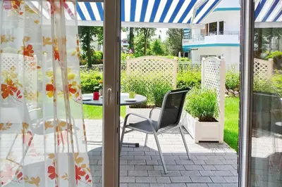 Ein Garten an der Unterkunft Strandvilla Strandvilla Appartement 7