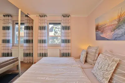 Ein Bett oder Betten in einem Zimmer der Unterkunft Residenz Seeschwalbe Residenz Seeschwalbe Appartement 4