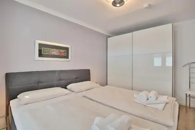 Ein Bett oder Betten in einem Zimmer der Unterkunft Seebrücke Seebrücke Appartement 2