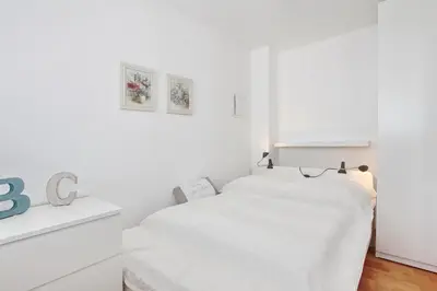 Ein Bett oder Betten in einem Zimmer der Unterkunft Haus Hansastrasse 2 Haus Hansastrasse 2 Appartement 6