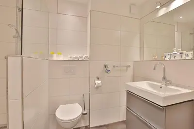 Ein Badezimmer in der Unterkunft Strandperle Strandperle Appartement 201
