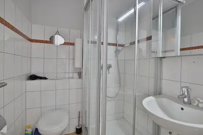 Ein Badezimmer in der Unterkunft Berliner Hof Berliner Hof Appartement 116