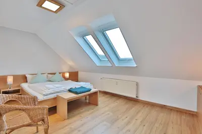 Ein Bett oder Betten in einem Zimmer der Unterkunft Ostsee-Residenz Appartement 8