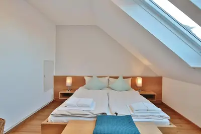 Ein Bett oder Betten in einem Zimmer der Unterkunft Ostsee-Residenz Appartement 8