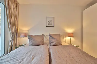 Ein Bett oder Betten in einem Zimmer der Unterkunft Strandglück Haus A Strandglück Appartement 12A