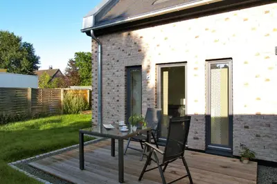 Ein Garten an der Unterkunft Haus Küstenkinder Haus Küstenkinder Marie Appartement 1