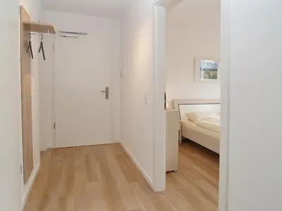Ein Bett oder Betten in einem Zimmer der Unterkunft Strandglück Haus C Strandglück Appartement 15C