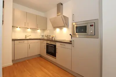 Küche/Küchenzeile in der Unterkunft Strandglück Haus A Strandglück Appartement 13A