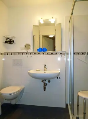 Ein Badezimmer in der Unterkunft Strandglück Haus A Strandglück Appartement 22A