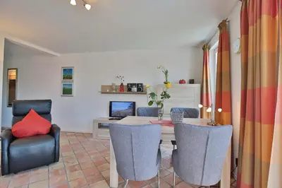 Ein Sitzbereich in der Unterkunft Feriendomizil am Konsulweg Feriendomizil am Konsulweg Appartement 7