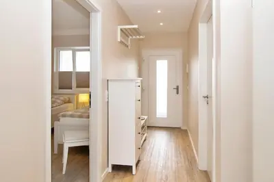 Ein Bett oder Betten in einem Zimmer der Unterkunft Strandglück Haus C Strandglück Appartement 17C
