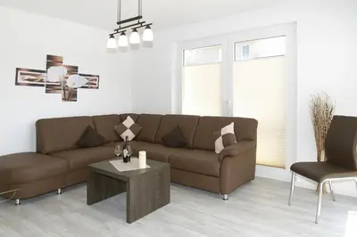 Ein Sitzbereich in der Unterkunft Strandglück Haus C Strandglück Appartement 09C