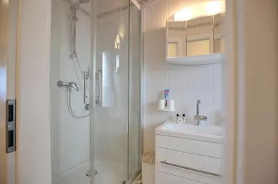Ein Badezimmer in der Unterkunft Residenz am Hang Residenz am Hang Meertraum Appartement 109