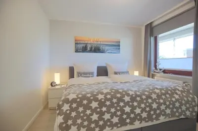 Ein Bett oder Betten in einem Zimmer der Unterkunft Haus Hansastrasse 13 Haus Hansastrasse Appartement HanSa Bay