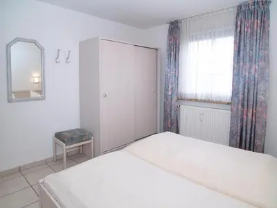 Ein Bett oder Betten in einem Zimmer der Unterkunft Parkresidenz Parkresidenz Appartement 6