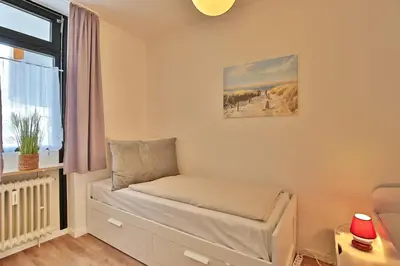 Ein Bett oder Betten in einem Zimmer der Unterkunft Berliner Hof Berliner Hof Appartement 313