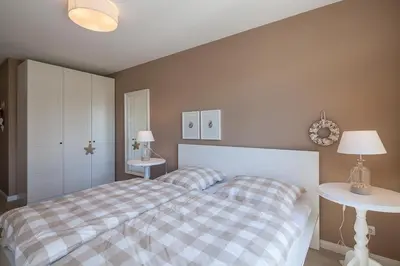 Ein Bett oder Betten in einem Zimmer der Unterkunft Strandglück Haus A Strandglück Appartement 8A StrandGutFinder de
