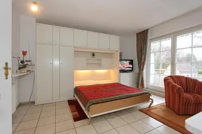 Ein Bett oder Betten in einem Zimmer der Unterkunft Haus Parkblick Parkblick Appartement 5