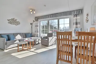 Ein Sitzbereich in der Unterkunft Haus Parkblick Parkblick Appartement 12