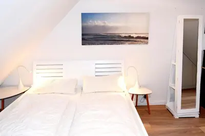 Ein Bett oder Betten in einem Zimmer der Unterkunft Maisonnette mit Charme Maisonette mit Charme