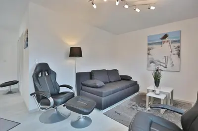 Ein Sitzbereich in der Unterkunft Residenz Strandnah Residenz Strandnah Appartement 1