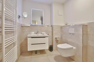 Ein Badezimmer in der Unterkunft Strandvilla Augustusbad Strandvilla Augustusbad Appartement Riverside