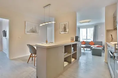 Ein Sitzbereich in der Unterkunft Strandvilla Augustusbad Strandvilla Augustusbad Appartement Riverside