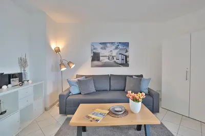 Ein Sitzbereich in der Unterkunft Strandburg Strandburg Appartement 1