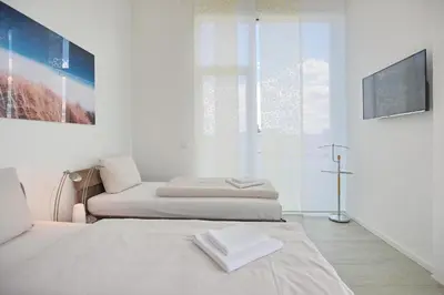 Ein Bett oder Betten in einem Zimmer der Unterkunft Logenplatz am Kammerweg Logenplatz am Kammerweg Appartement 12