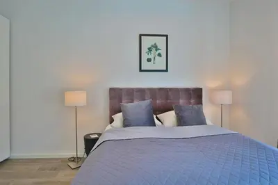 Ein Bett oder Betten in einem Zimmer der Unterkunft Haus Meeresbrise Haus Meeresbrise Appartement 19
